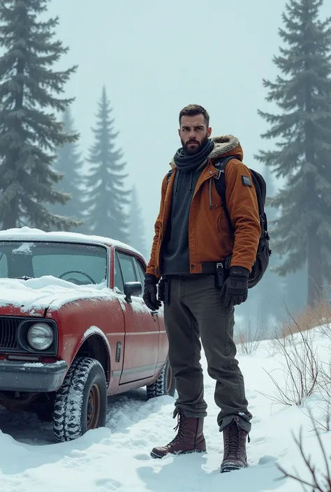 A handsome man with short beard stands near a broken car in snow