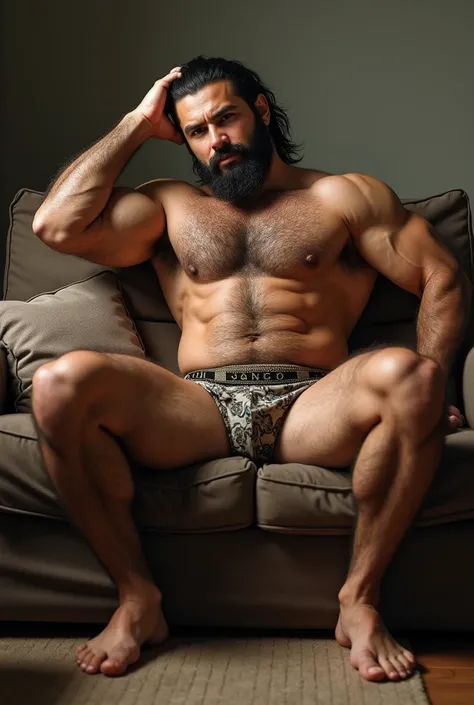 John Sena muscled shirtless , showing hairy armpits, of cueca,  sitting on the couch with his legs wide,  he has his hand behind his head and naked