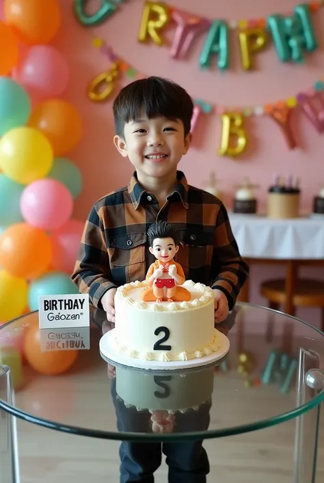 The best photo was taken of a handsome  Korean boy, with neatly styled hair. Pose aktiv and cheerful smile to camera. The  was having a birthday, and in front of him was a luxurious glass table with a birthday cake in the shape of a boys toy character. the...