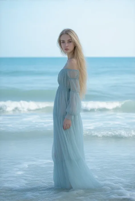  A tall girl with long light blond hair,  grey eyes , stands on the beach near the sea , in a long blue dress