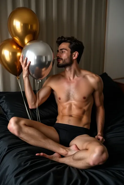 sexy 30-year-old man , sentado en una cama de sabanas negras brillantes elegants  entre las piernas,  wearing a black bathing suit , shirtless,  Abdominals ,  slim body,  slim body, hugging gold and silver balloons,  blowing up gold and silver balloons, el...