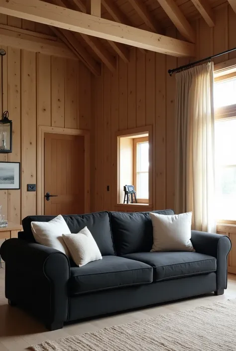  Black sofa with white cushions in the center of the living room, front view, Barnhouse style, in the background walls covered with wooden wagon, high ceilings with exposed beams, natural wood, soft lighting, one window on the right wall, covered with beig...