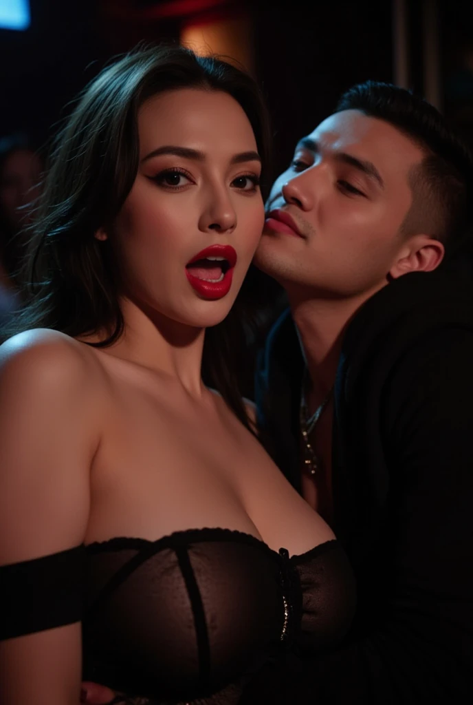 dua lipa wears black strapless transparent top, she has heavy makeup, red lipstick, open her mouth wide. she sit intimately with a black man in a night club