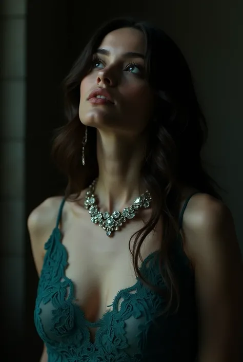 A cinematic portrait of an elegant woman in a dimly lit room, wearing a teal lace evening gown with delicate thin straps. Her neckline is adorned with a sparkling, intricate necklace that catches the light subtly. She has long, flowing dark brown hair styl...