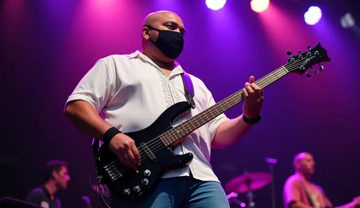 A fat young bassist takes center stage, his confident presence adding a grounding energy to the band’s performance under the glow of purple and amber stage lights. He has a slightly stocky build with a hint of a belly, emphasizing his approachable and laid...