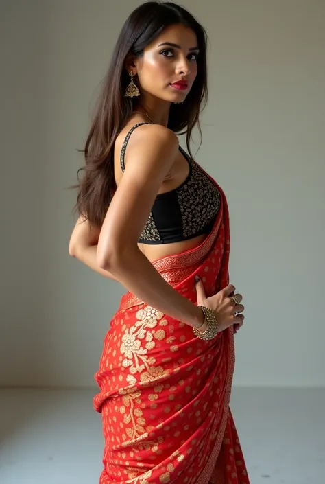 Young Indian woman with a fit and athletic build, attractive, straight brown hair and a pretty face, wearing elegant makeup and a stunning saree featuring a sleeveless blouse that highlights her toned arms and midriff, accompanied by a matching pallu and p...