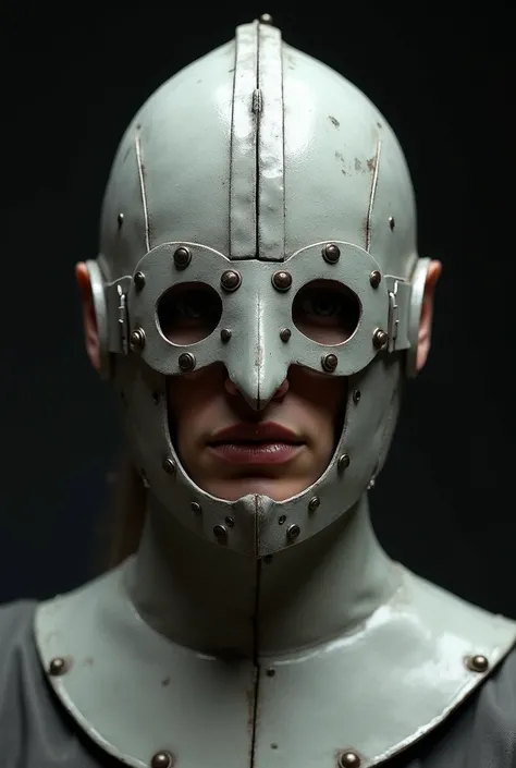 
The helm of agony a medieval torture device that covers the head .metallic, visor-like headpiece with a steel blindfold that has been stapled to the skull The headpiece is a light gray/silver metal, and appears to be a slightly curved, half-mask design. I...