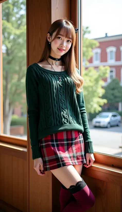 A young woman stands in front of a large window with wooden frames, positioned slightly to the right of center in the frame. She has long, light brown hair styled with a small black hair clip on the right side. The woman is wearing a forest green ribbed ca...