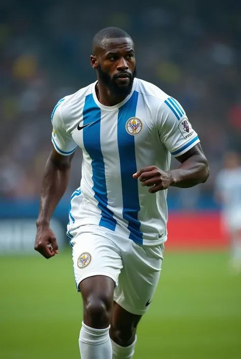  A soccer player wearing white equipment with vertical blue striped lines with straight and short hair , Practically shaved and bearded , very dark-skinned 