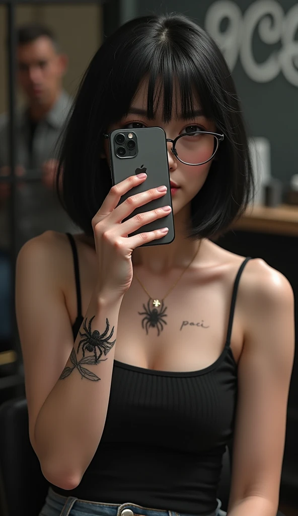 female, black hair,short hair, glasses, sits in a tattoo studio and is having a tendril with little spider tattooed on her wrist, professional tatto , the name "Paci" is written above her left chest, holding a Iphone 15 pro max in front of their face , cov...