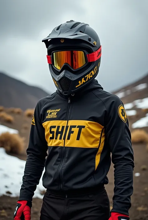 "A motocross rider standing outdoors, wearing a black helmet with reflective goggles, a black and gold jersey labeled SHIFT, and red gloves. The setting is a rugged, cloudy landscape with patches of snow and grass, under a dramatic, overcast sky. The scene...