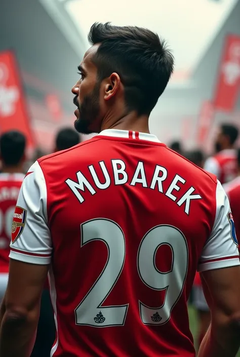 A man that wear arsenal jersey name mubarek number 29