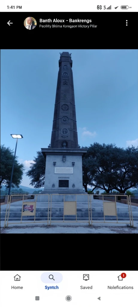 Generate an image of Generate an image of The Bhima Koregaon Victory Pillar is not just a historical monument but also a symbol of resistance and assertion for the Dalit community