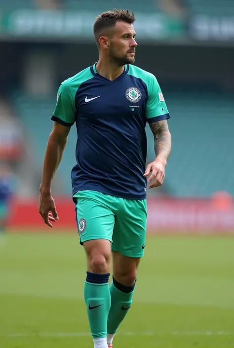 soccer uniform with the shoulder sleeves in navy blue and the trunk in aqua green