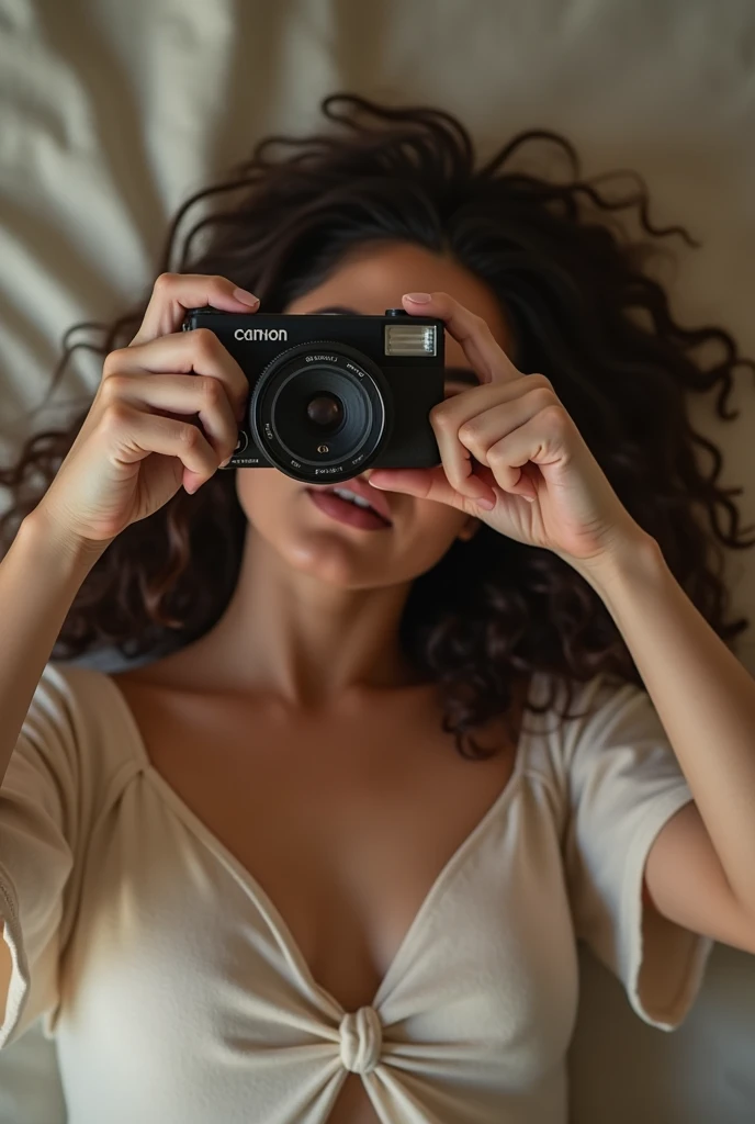 Girl taking a picture of her underwear while lying down