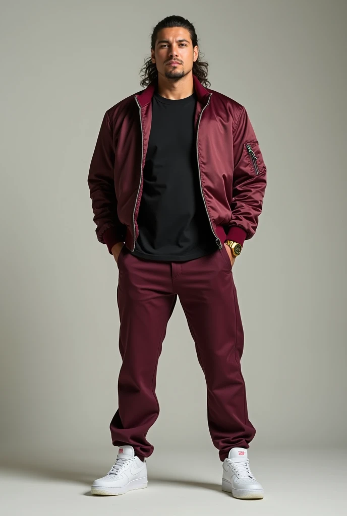 make man with mullet hair wearing with black t shirt and layering with maroon bomber jacket and maroon trouser paired with airforce 1 shoes and michael kors gold watch