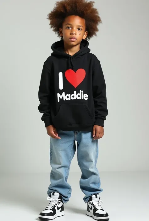 A 16-year-old  very white light skinned african american boy with an big afro featuring light brown hair and fish lips and acne on his cheeks and small brown eyes and is wearing a black hoodie with the phrase I love Maddie and light blue jeans paired with ...