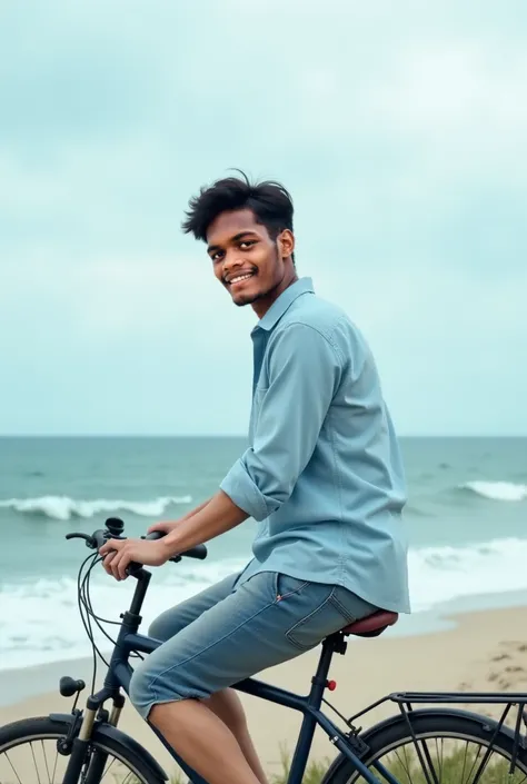 "A 23 young man sitting on a bike near a beach, wearing a light blue shirt, with ocean waves in the background under a cloudy sky. The focus is on the serene setting, blending nature and adventure."
