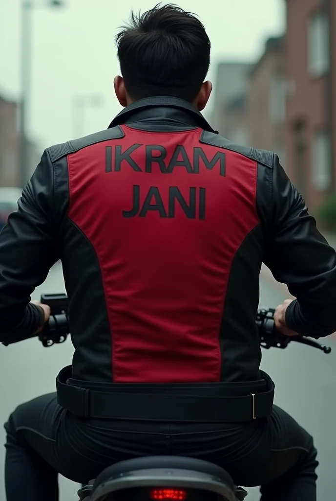 A man wear black colour paint red colour shirt back side of shirt name ikram jani and he riding bike 