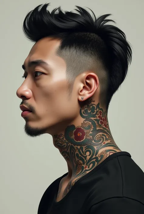 Side view of Asian man with neck tattoos