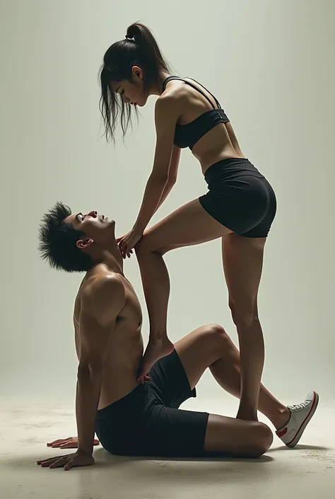 Kneeling man and a 20-year-old woman putting her foot on the mans neck 