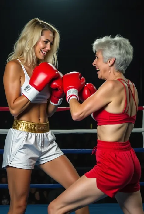 A beautiful blonde woman, wearing white metallic short shorts, gold belt, white socks, red boxing gloves, sweaty, being knocked backward in a boxing ring by a shorter and smaller gray-haired 50 year old woman wearing red athletic shorts and red boxing glov...