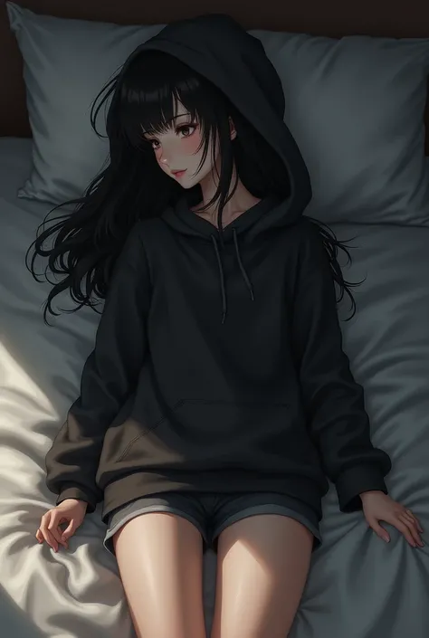 A  girl with black hair and eyes, in black hoodie and shorts, in bed