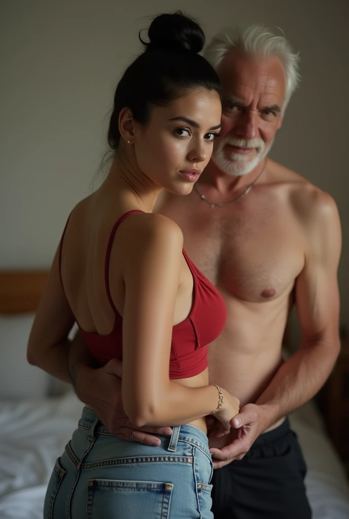 a young and beautiful woman with black hair in a bun, wearing a red bra, tight jeans, she stands facing the camera, hugged from behind by her husband, an old man without a shirt, black shorts, in their bedroom