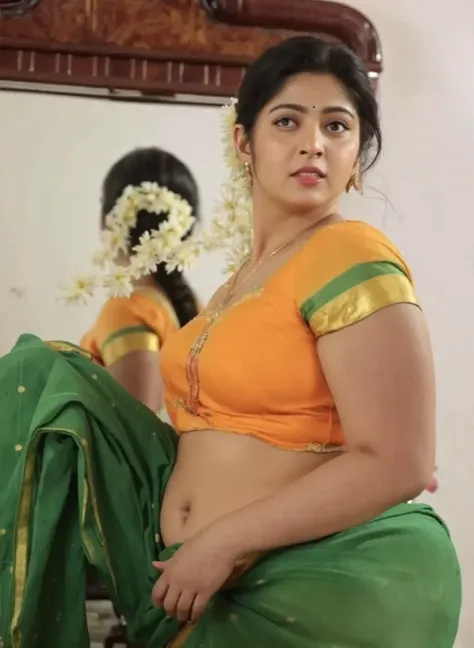 Indian plus size aunty wearing yellow blouse, draped green saree,fat belly big buttocks