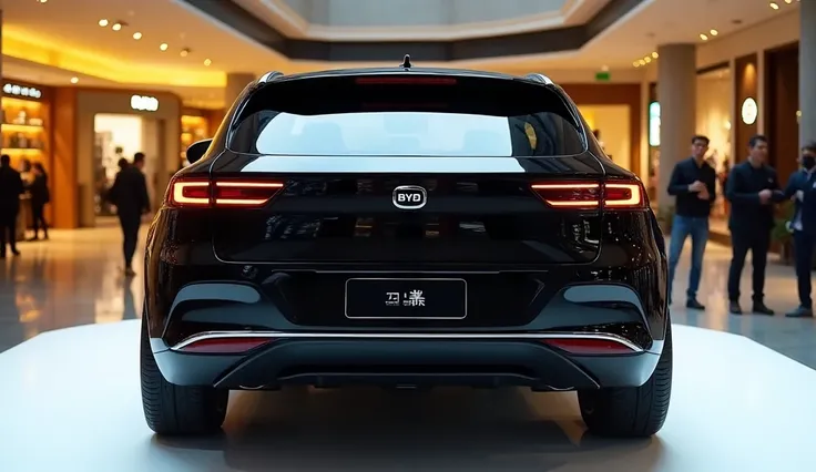 A back bumper view photo of a Black 2025 BYD Tang EV with a sleek, full modified, modern design. The logo Tang EV is visible on the car. The car is parked on a white surface. The background is a shopping mall with yellow lights. The photo reveals the luxur...