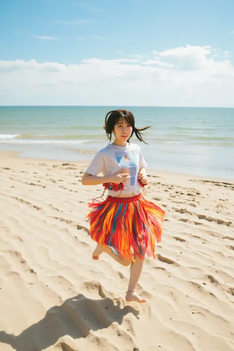 A woman wearing a dress and running on a sandy beach