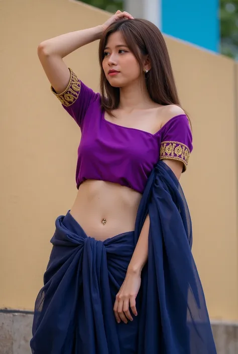 A striking portrait captures an elegant woman posing against a soft, muted backdrop. She is wearing a vibrant purple blouse with intricate gold embroidery along the sleeves, complementing her flowing navy blue saree that drapes gracefully around her hips a...