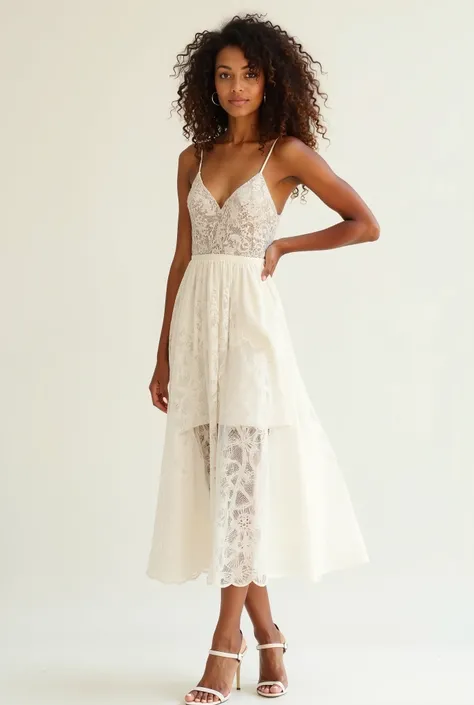 Beautiful morrocan lady with curly hair wearing an elegant, mid-length A-line dress with a geometric lace overlay in a soft, off-white or ivory color. It features delicate spaghetti straps, giving it a sophisticated and feminine appeal. The sheer overlay c...