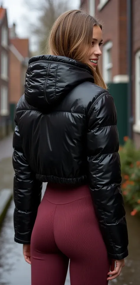 Backside diagonally photo from side behind of a sweaty hot wet cute beautiful darkblonde furtuned dutch spanish italia young posing age femboy wearing black canada-goose shiny pvc puffy cropped short puffer jacket, very short shiny black Big luxurious cana...