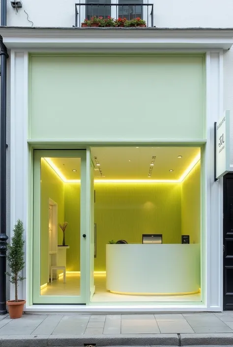 Facade from the street at a general angle, of a very modern spa venue , color white with a little light green lemon very subtle ,with sign without logo, with open doors and windows, where you can observe the reception of customers.
