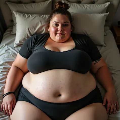 An extremely obese 1000lb 20 year old woman model in a very tight shirt and black tight lycra shorts. She is wearing a lot of makeup. She is visibly sweating and has sweat dropping her face. Her outfit is very sweaty. She has a beautiful face and eyes and ...