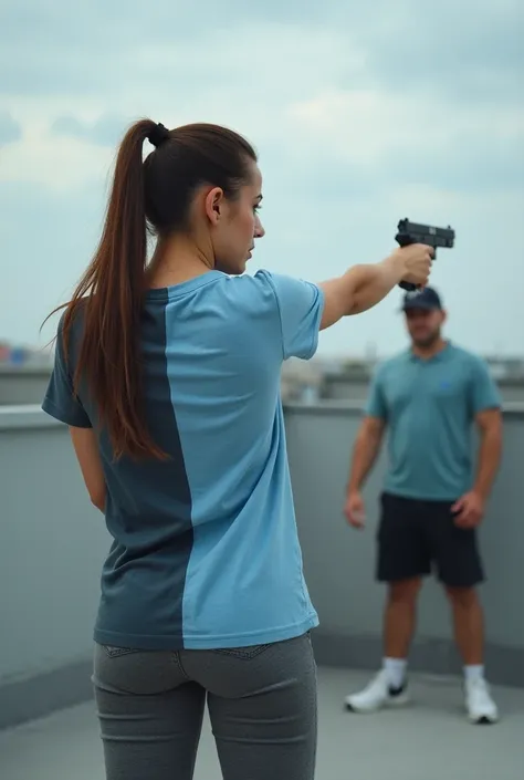 A woman wearing a t-shirt half Blue and the other half Celeste,  a gray pants that cover the entire leg and black shorts. The woman is with a gun in her hand on the roof of a building pointing at a security guard.