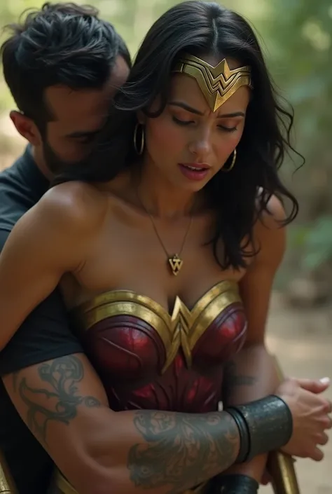 live-action、Wonder Woman is hugged strongly from behind by a thug、Wonder Woman is in agony、Wonder Woman is being dumped by thugs、 Wonder Woman is Japanese in her 20s 、 depicts the whole body、 Long Shots