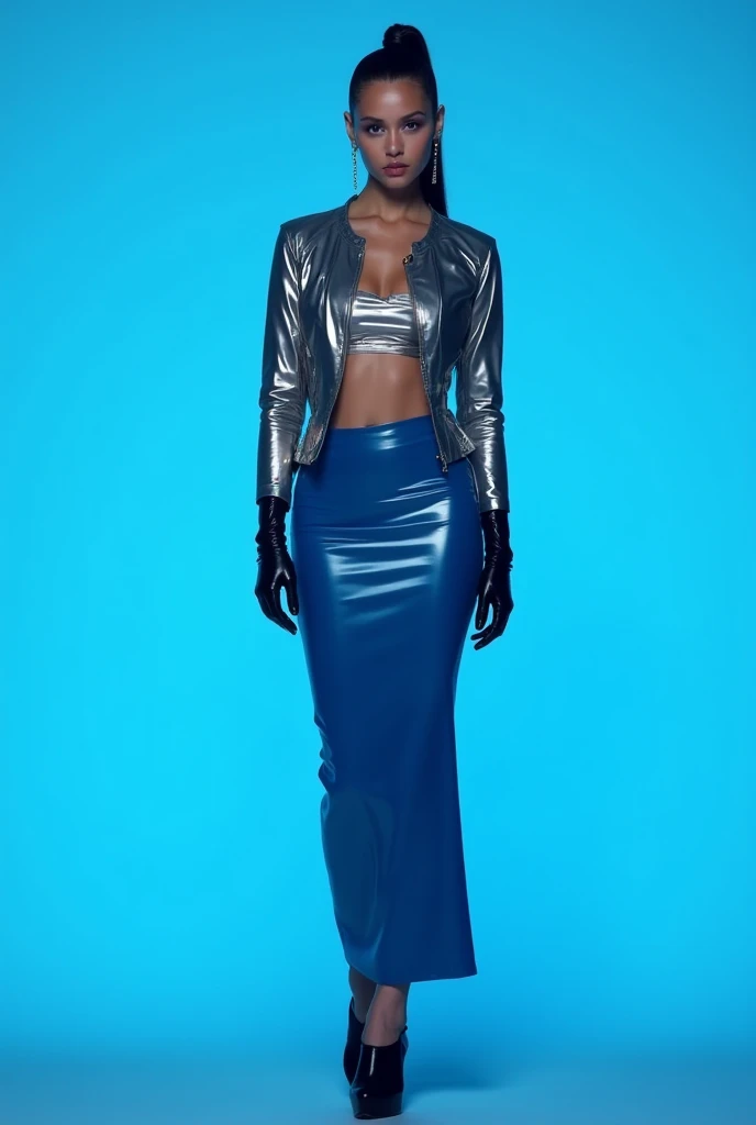 Cyberpunk skinny stands against blue backdrop dressed striking ensemble tight shiny blue latex maxi skirt silver top metallic silver tight latex jacket complemented black high heels vinyl gloves dark hair styled sleek ponytail. The woman is alone in the ph...