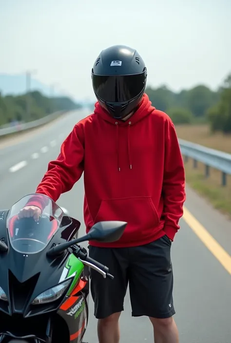 Long distance photo of clean white asian guy. age 18 years.  Wearing a red plus size Hoodie jacket.  jordan shoe shorts. Wearing full face gp helmet. Stand leaning on a Kawasaki H2R sport bike.  With hod covering face. With the background on the highway. D...