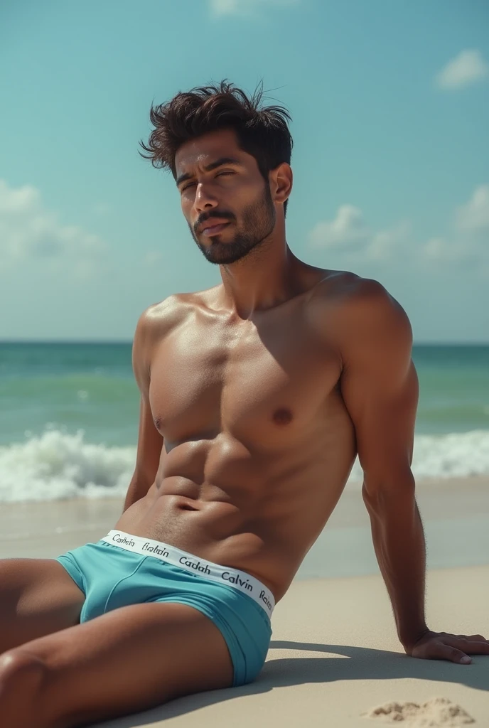 Side view Morning seen  very young Indian 
  adult   handsome  boy  with  6 pack ab sleeping in morning  on beach , very very handsome as much as possible, uncovered without a shirt and remaining in sky   blue   trunk underwear calvine kile company barding...