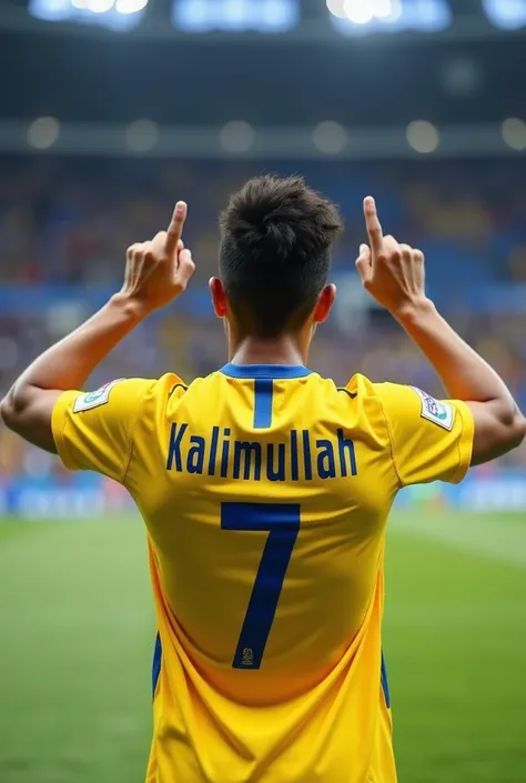 A 20-year-old man dressed in yellow and blue from behind was photographed at the FIFA World Football Field, pointing to his name with his hands clasped, with his name written on the back of it, Kalimullah, and the number 7, and the four of which are not kn...