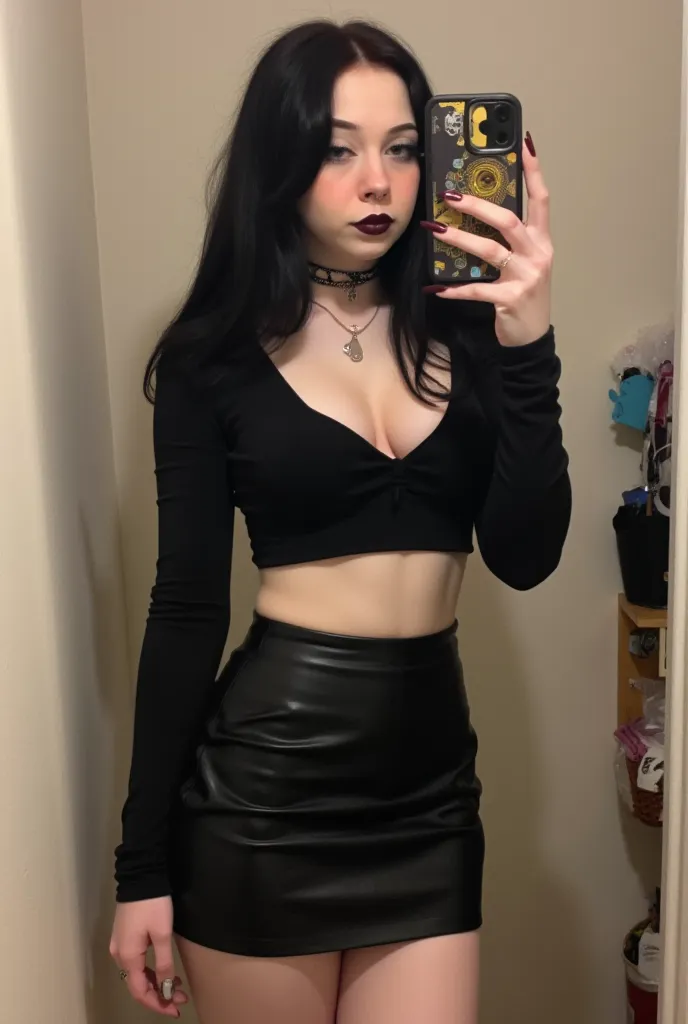  a picture of Haylee .
A selfie of a goth woman with long hair,  big breasts, And black eyes,  wearing a skirt and a short top  ,   that shows her abdomen and wears a necklace  .  ,  goth girl