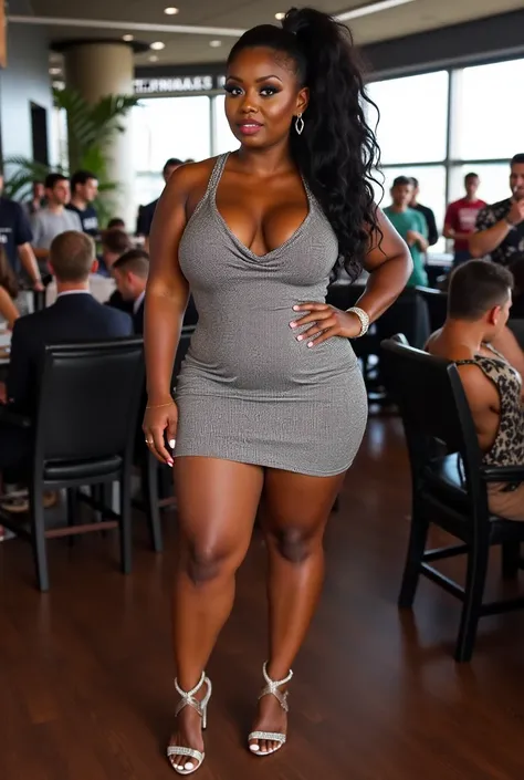 A curvaceous Black woman wearing a shimmering, silver, chainmail mini dress with a cowl neck and a low back, paired with silver, strappy heels. She's accessorized with diamond stud earrings and a delicate silver bracelet. Her hair is styled in a sleek, hig...