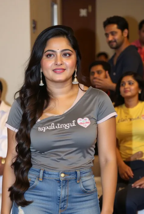 Cute chubby Indian hot actress in grey T-shirt and tight short jean shorts seeing at the viewer swaying the body and butt