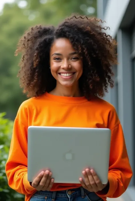 curl girl ware a orange colour top and she hold laptop on her hand .her face in happy and look font and absolutly she stand realsick need real one