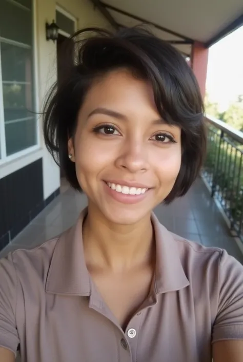   Woman with light brown skin  ,age 30 years,  square face ,  short and dark brown hair   ,  30 years  ,    dark brown eyes   ,  polo shirt , location a partition house  ,Mexican nationality, Posing for a Facebook profile picture 