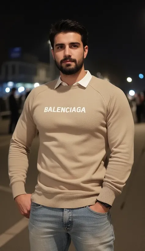 a young handsome turkish guy with muscle,  dark short hair and goatee beard amateur photo random picture he is in cologne he wearing a beige tight sweater with collar  says balenciaga in white and a loose light jeans and has very much muscles amateur its n...