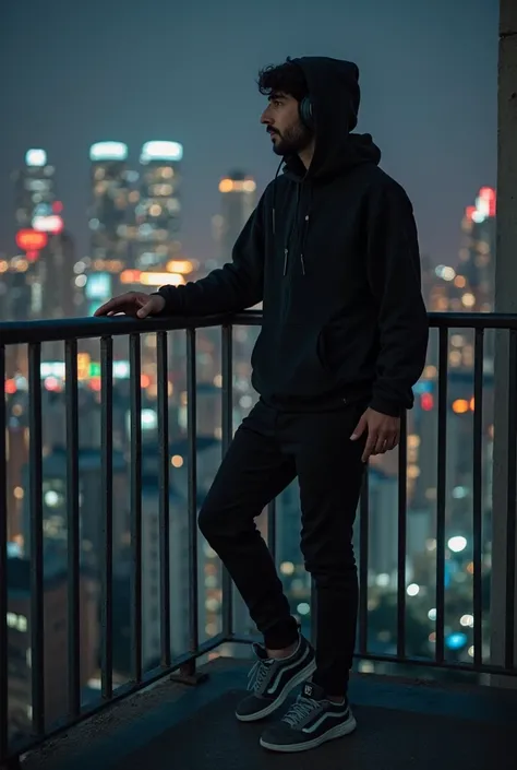  30-year-old man wearing a black hooded jacket. black pants gray sneakers wearing a black  serene night cityscape, a person leaning on a balcony railing with headphones, สวมหน้ากากสีดำ ตาไม่โฟกัส สะพายเป้ ยืนอยู่คนเดียวข้างถนน ฝนตก แสงน้อย บรรยากาศน่ากลัวม...