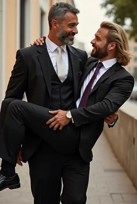  Tall and muscular Arab man ,  with slightly gray hair and slightly gray beard , dressed in a black two-piece suit, white shirt and white silk tie,  affectionately carrying a young blond man with long hair brushed backwards,  with beard and sturdy build , ...